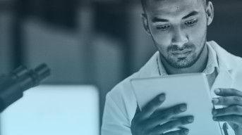 Man looking at tablet computer